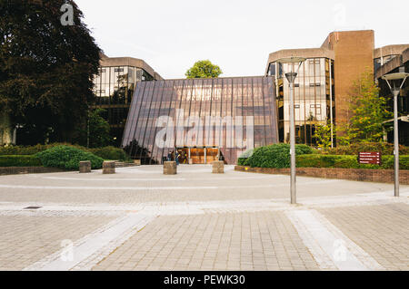 LIMERICK, IRELAND - AUGUST 28, 2010: Two young men stand in front of the Main Building of the University of Limerick. Stock Photo