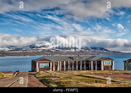 buildings of russian mining town Barentsburg in front of landscape, Svalbard or Spitsbergen, Europe Stock Photo