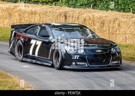 2017 Elvis Presley Chevrolet SS NASCAR winner with driver Ed Berrier at the 2018 Goodwood Festival of Speed, Sussex, UK. Stock Photo