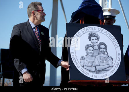 A honorary Presidential one dollar coin, displaying a portrait of First Lady Nancy Reagan is unveiled at the President Ronald Reagan wreath laying ceremony, at the Ronald Reagan Presidential Foundation and Library, Simi Valley, Calif., Feb. 6, 2016. The purpose of this ceremony is to honor the 105th Anniversary of his birth and pay tribute to his distinguished service to a grateful nation. (U.S. Marine Corps photo by Cpl. Brian Bekkala/MCIWEST-MCB CamPen Combat Camera/Released) Stock Photo