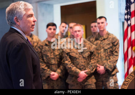 Robert A. Sherman, (right), U.S. Ambassador to Portugal, gives his remarks to Special-Purpose Marine Air-Ground Task Force-Crisis Response- Africa, at U.S. Embassy, Lisbon, Portugal, Feb. 10, 2016. SPMAGTF-CR-AF conducts a scaled embassy reinforcement exercise at American Embassy Lisbon in coordination with the Regional Security Office and host nation security forces in order to enhance mission essential task proficiency and build relationships. (U.S. Marine Corps photo by Sgt. Kassie L. McDole/Released) Stock Photo