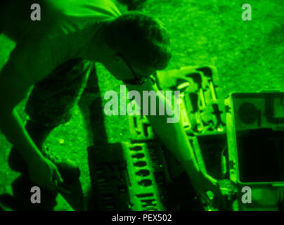 Staff Sgt. Mark Rippy, air reserve technician hydraulics specialist, 315th Maintenance Squadron, working with the 437th MXS gathers tools from a consolidated kit to begin work to troubleshoot a flight control system fault that has been isolated to the tail elevator integrated flight control modules, causing am unsafe condition on a transient C-17 Globemaster III cargo aircraft on the flightline at Joint Base Charleston, S.C. Proper tool selection increases efficiency by reducing the amount of time maintenance personnel have to go back and for between a work site and a tool kit to retrieve nece Stock Photo