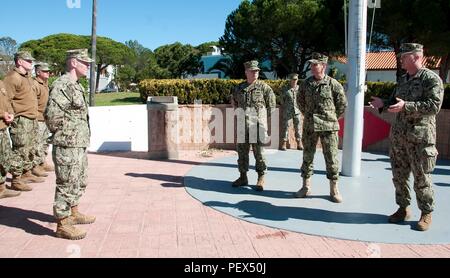 160216-N-MW990-010 NAVAL STATION ROTA, Spain (Feb. 16, 2016) Cmdr. Kemit Spears, right, commanding officer, Naval Mobile Construction Battalion (NMCB) 1, speaks to service members assigned to NMCB 133 during a turnover ceremony between NMCB 1 and NMCB 133 at Naval Station Rota, Spain, Feb. 16, 2016. The turnover marked the beginning of the NMCB 133 deployment to Rota’s Seabee camp, Camp Mitchell. U.S. 6th Fleet, headquartered in Naples, Italy, conducts the full spectrum of joint and naval operations, often in concert with allied, joint, and interagency partners, in order to advance U.S. nation Stock Photo