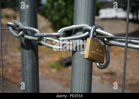 photo of steel chain with padlock closed Stock Photo
