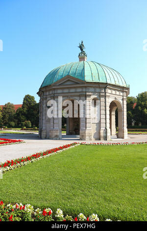 Munich, Germany, summer view of the Hofgarten round pavilion in the baroque garden built in17th century by Maximilian I, Elector of Bavaria in Italian Stock Photo