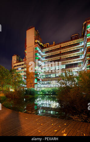 The modern university clinic of Aachen, Germany at night. Perspective corrected via lens shift. Stock Photo