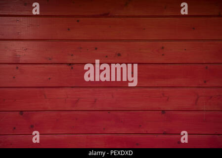 Dark Red wooden wall as background. Red texture. Wooden red fence. Red plank Stock Photo