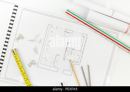 Creative flat lay overhead top view blueprints architectural flat project plan and office supplies on decorator white table workspace with swatches to Stock Photo