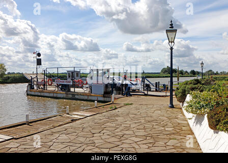 A vehicular chain ferry unloading after crossing the River Yare on the Norfolk Broads at Reedham Ferry, Reedham, Norfolk, England, UK, Europe. Stock Photo