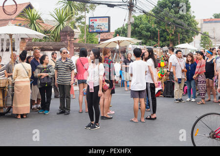 Standing motionless to the Thai national anthem Thailand Stock