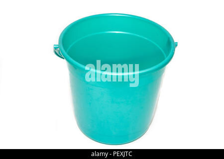 A bucket on a white background. Plastic green bucket on a white background. Bucket for washing floors. Cleaning bucket Stock Photo