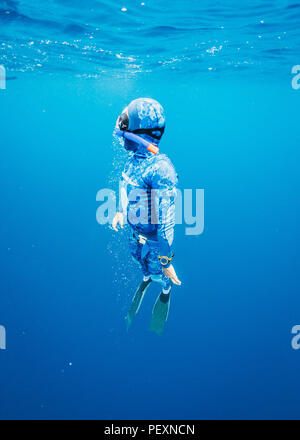 Free diver underwater Stock Photo