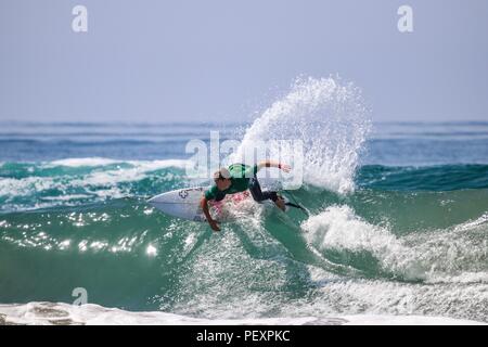 Tyler Gunter competing in the US Open of Surfing 2018 Stock Photo