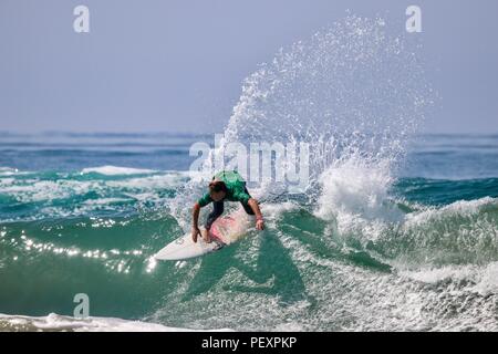 Tyler Gunter competing in the US Open of Surfing 2018 Stock Photo