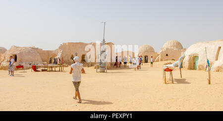 Tourist and old Star Wars set in the Sahara desert near city Tozeur, Tunisia, Africa Stock Photo