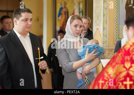 Belarus, Gomel, May 6, 2018. Church of Volotovo. Godparents in the church at the baptism of a newborn child. Orthodox baptism Stock Photo