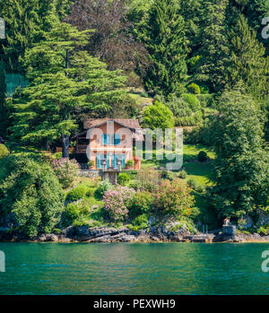 Idyllic villa near Ossuccio, small and beautiful village overlooking Lake Como, Lombardy Italy. Stock Photo