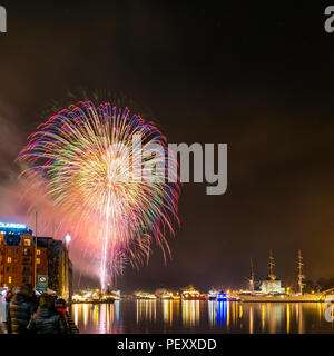 Fireworks in Bergen, Norway, at New years eve celebration. Stock Photo