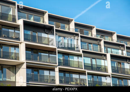 Facade of a modern housing construction with a lot of balconies seen in Berlin, Germany Stock Photo