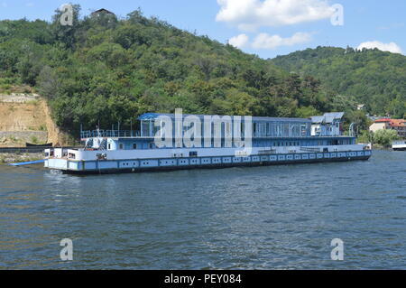 Boat docked at the shore of the Danube Stock Photo