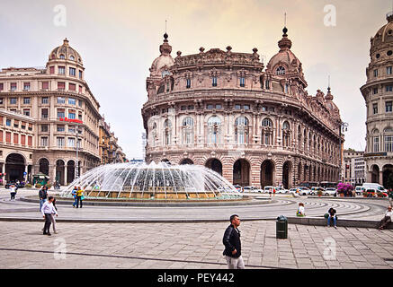 GENOA, ITALY - MAY 7, 2013 Panoramic view of De Ferrari square in Genoa, the heart of the city with the central fountain and the Liberty architecture  Stock Photo