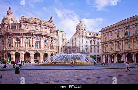 GENOA, ITALY - MAY 7, 2013 Panoramic view of De Ferrari square in Genoa, the heart of the city with the central fountain and the Liberty architecture  Stock Photo