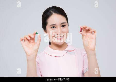 Portrait Of Asian Female Nurse isolated on white background. 050 Stock Photo