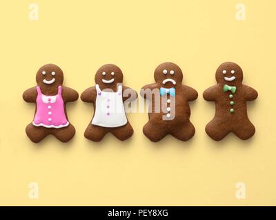 Four gingerbread men and women. Stock Photo