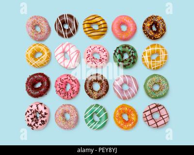 Colourful doughnuts, studio shot. Stock Photo