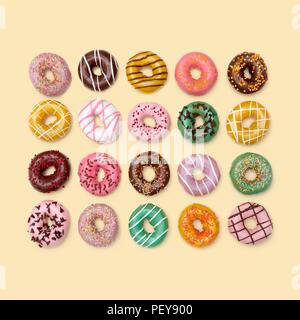 Colourful doughnuts, studio shot. Stock Photo