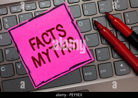 Text sign showing Facts Myths. Conceptual photo work based on imagination rather than on real life difference Pink paper keyboard Inspiration communic Stock Photo