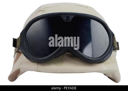 army kevlar helmet with goggles and camoflage cover isolated on white background Stock Photo