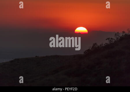 Red sunset with big sun Stock Photo