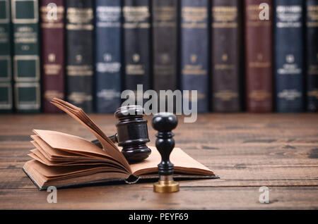 Law and Justice, Legality concept, Notary Seal, Judge Gavel and Law book on a wooden background. Stock Photo