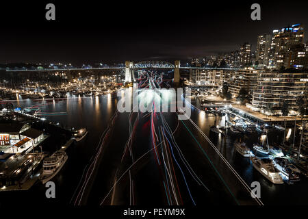 Light trails from boats near English Bay, Vancouver, returning from thae fireworks display, Celebration of Light.