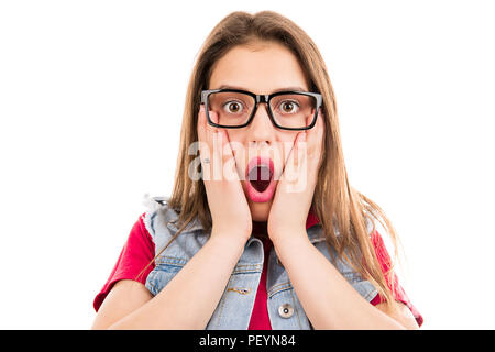 Pretty woman in glasses holding hands on cheeks and looking at camera isolated on white background Stock Photo