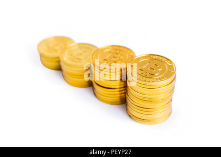 Golden bitcoin coins stack. Isolated on white background with clipping path Stock Photo