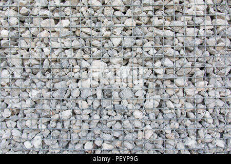 stone wall Blocks with Mesh Wire metal Stock Photo