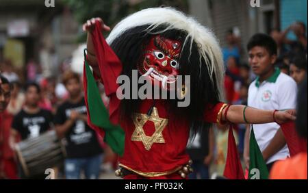 Kathmandu, Nepal. 17th Aug, 2018. A masked dancer performs during the Bagh Bhairav Festival at Kirtipur in Kathmandu, Nepal, Aug. 17, 2018. Devotees offered prayers and made 108 rounds of the Bagh Bhairav temple to get rid of sins during the Bagh Bhairav Festival. Credit: Sunil Sharma/Xinhua/Alamy Live News Stock Photo