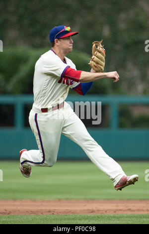 Philadelphia Phillies shortstop Scott Kingery (4) throws to first base  during a spring training baseball game against the Philadelphia Phillies on  March 26, 2023 at Ed Smith Stadium in Sarasota, Florida. (Mike