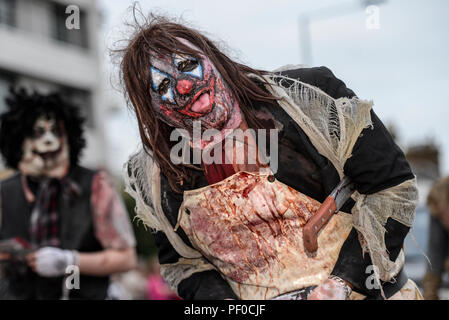Southend SummerCare Carnival Procession. Southend on Sea, Essex, UK. Canvey Island Fright Nights zombie in the carnival parade Stock Photo