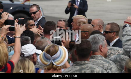 The President of the United States, Donald J. Trump greets friends and family at Francis S. Gabreski Airport, Westhampton Beach, N.Y., August 17, 2018. Francis S. Gabreski Airport is the home of the New York Air National Guard's 106th Rescue Wing.  (U.S. Air National Guard photo by Senior Master Sgt. Cheran A. Cambridge) Stock Photo