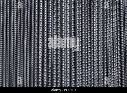 Steel rebar used in contruction laying on the ground in Vietnam. Stock Photo