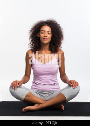 Man yoga class. Black wear. Calm relax pose Stock Photo - Alamy