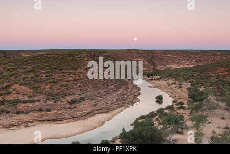 The Moon rises after sunset over kalbarri National Park WA Western Australia Oceania Stock Photo
