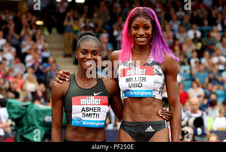 Great Britain's Dina Asher-Smith (left) with Bahamas' Shaunae Miller-Uibo after the Women's 200m during the Muller Grand Prix at Alexander Stadium, Birmingham. Stock Photo