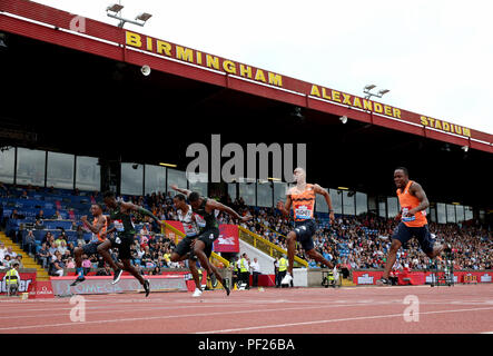 Great Britain's Reece Prescod (second left) finishes second, USA's Christian Coleman (centre) wins and USA's Noah Lyles (left) finishes third in the Men's 100m Final during the Muller Grand Prix at Alexander Stadium, Birmingham. Stock Photo