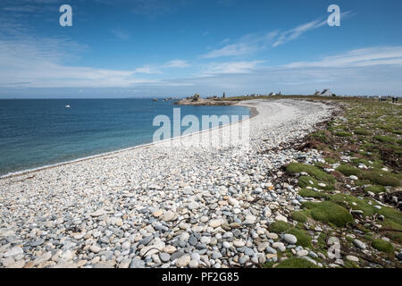 White pebble beach on the island of Sein in Bretagne (France). Stock Photo