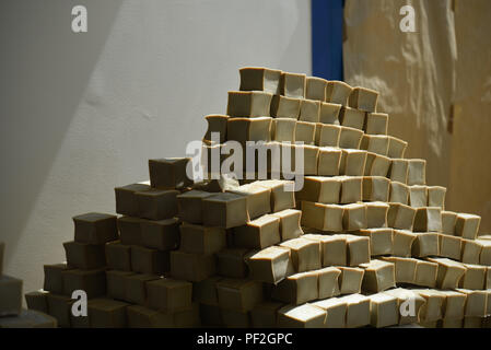 July 3, 2017 - Santeny, France: Aleppo soaps drying in the Alepia factory in Santeny, a suburb 30 kilometres east of Paris. The factory began producing traditional Aleppo soaps after factories in the Syrian city of Aleppo were destroyed during the civil war.  Reportage dans une fabrique de savons d'Alep en banlieue parisienne. Le maitre savonnier est un Syrien qui a ete oblige de fuir son pays du fait de la guerre civile. *** FRANCE OUT / NO SALES TO FRENCH MEDIA *** Stock Photo