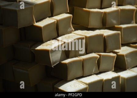 July 3, 2017 - Santeny, France: Aleppo soaps drying in the Alepia factory in Santeny, a suburb 30 kilometres east of Paris. The factory began producing traditional Aleppo soaps after factories in the Syrian city of Aleppo were destroyed during the civil war.  Reportage dans une fabrique de savons d'Alep en banlieue parisienne. Le maitre savonnier est un Syrien qui a ete oblige de fuir son pays du fait de la guerre civile. *** FRANCE OUT / NO SALES TO FRENCH MEDIA *** Stock Photo